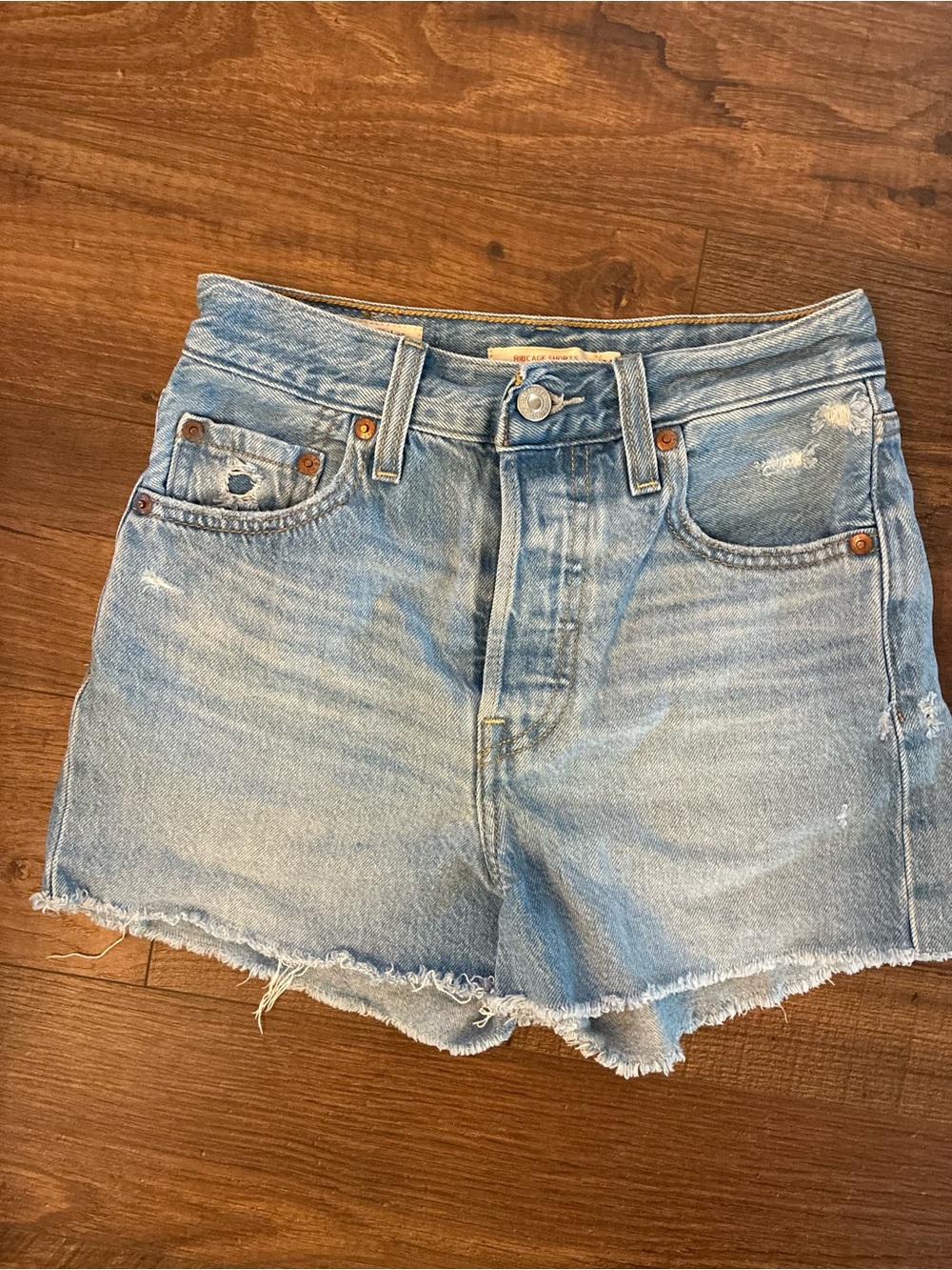 Levi’s Ribcage Light Wash Distressed Denim Cutoff Shorts